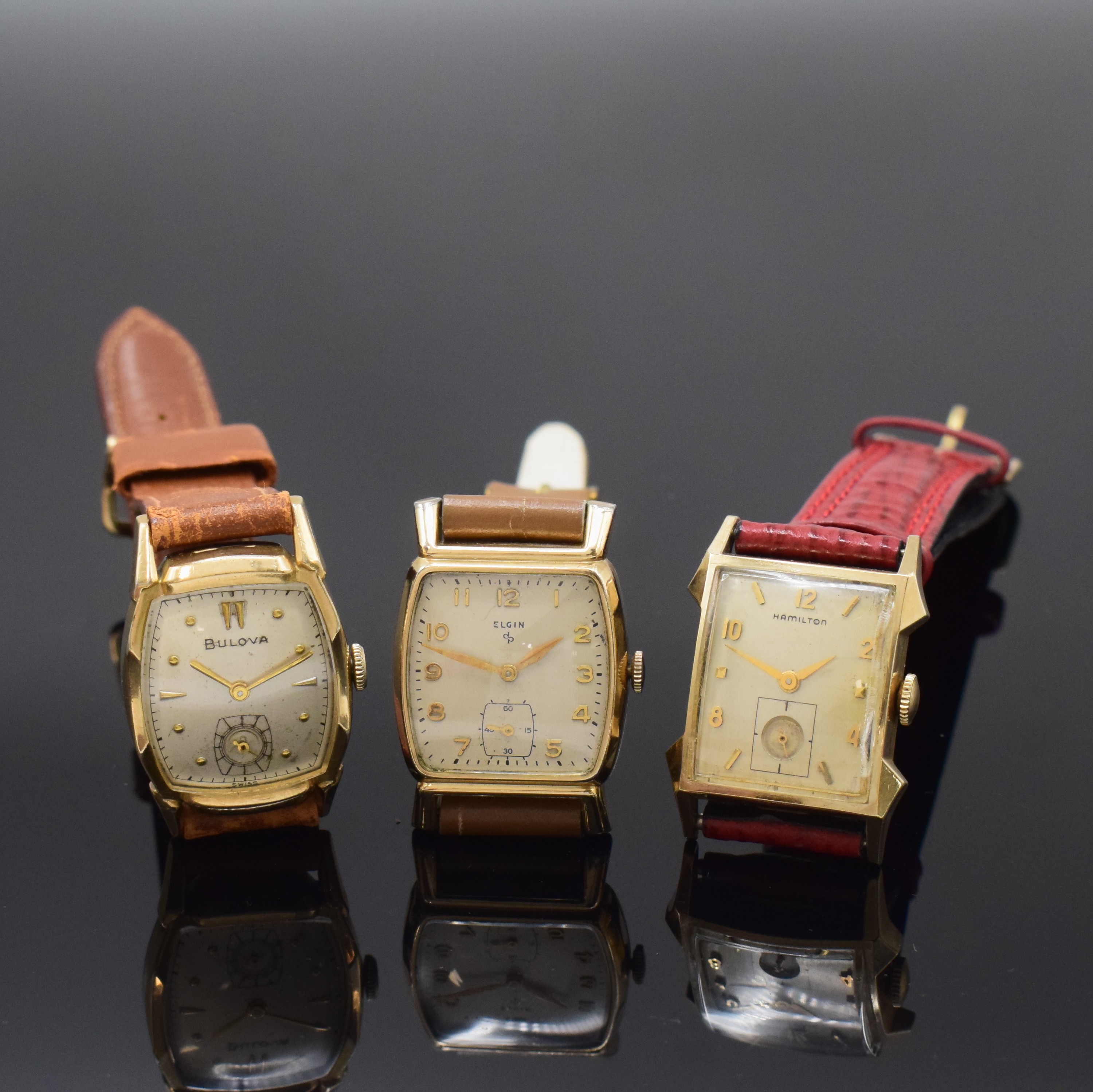 HAMILTON, ELGIN und BULOVA 3 Damenarmbanduhren, alle Handaufzug, Schweiz / USA um 1950/60, 1.) Hamilton 10k Gold Filled, silb. Zifferbl. m. aufgel. ...