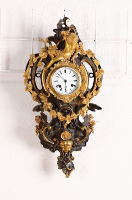 Image Smaller cartel clock, France around 1840/50, bronze casing partially patinated, shell ...