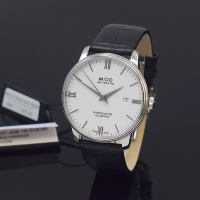 Image MIDO Baroncelli chronometer nearly mint gents wristwatch reference M027408, self winding, stainless steel case including original leather strap with butterfly buckle, on both sides glazed, case back screwed-down 4-times, white dial with silvered hour-indices and Roman numerals, date at 3, calibre 80, diameter approx. 40 mm, condition 1-2