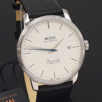 Image 26788249c - MIDO Baroncelli Heritage nearly mint gents wristwatch reference M027407A, self winding, stainless steel case including original leather strap with buckle, case back screwed-down 4-times, on both sides glazed, silvered structure-dial with dash-indices, blued second-hands, date at 3, diameter approx. 39 mm, condition 1-2