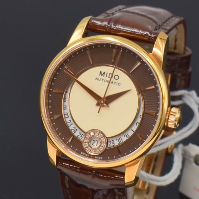 26788262a - MIDO Baroncelli nearly mint wristwatch reference M007207, self winding, gold-plated stainless steel case including original leather strap with butterfly buckle, on both sides glazed snap on case back, brown/cream colored structure-dial with gilded hour- indices, gilded hands, date at 6, diamonds, diameter approx. 33 mm, condition 1-2