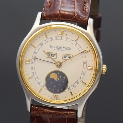 26789513a - Jaeger-LeCoultre fine, astronomical gents wristwatch reference 141.119.5, self winding, stainless steel/gold combined including original leather strap with gold-plated original buckle, case back 4-times screwed down, display of hours, minutes, day, date, month and moon phase, correction at the sides in case inserted, rhodium plated movement, central rotor, 28 jewels, calibre 901, fausses cotes decoration, diameter approx. 34 mm, original box, setting pin and papers, sold in March 1989, condition 2, property of a collector