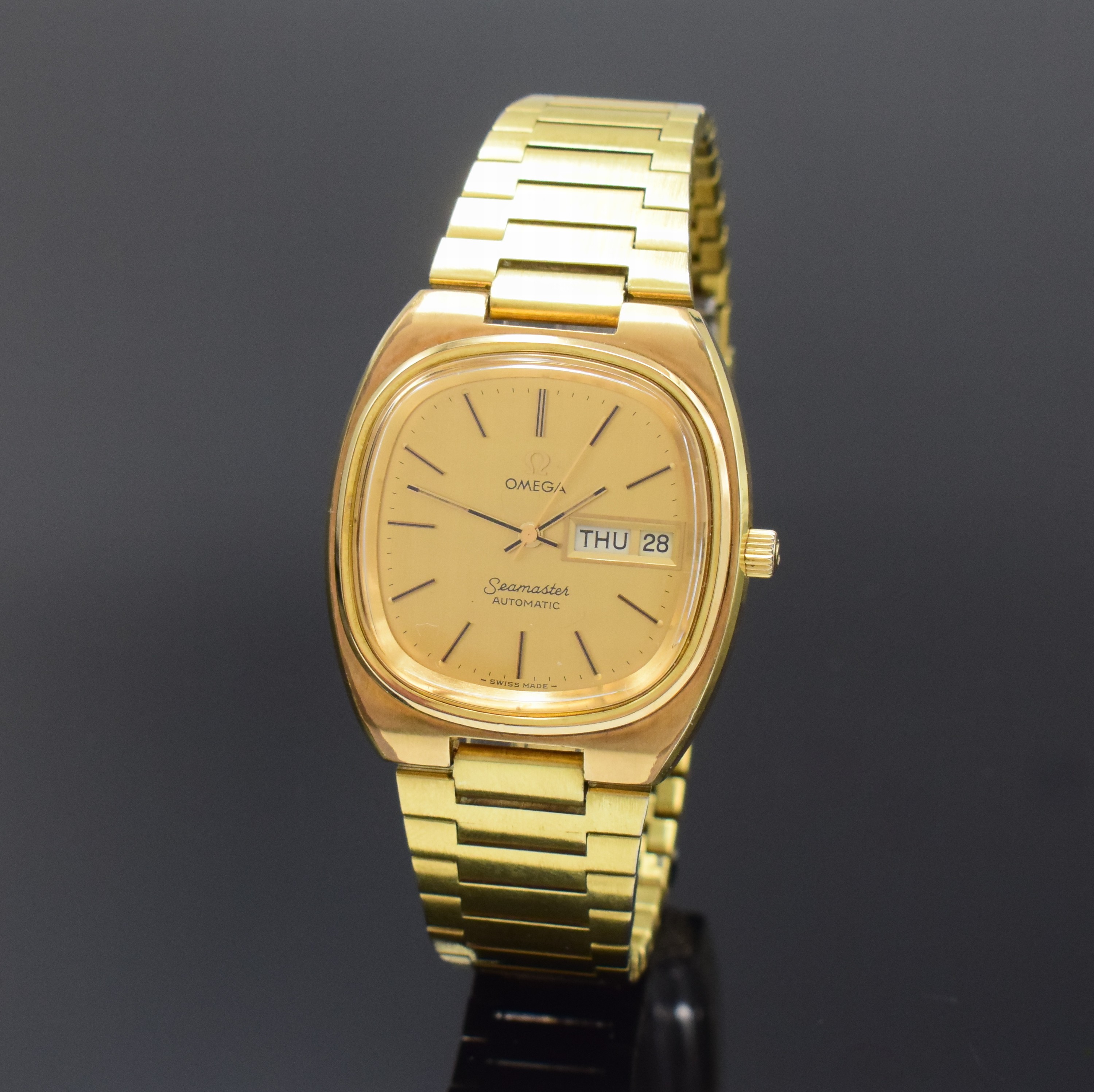 OMEGA Seamaster vergoldete Herrenarmbanduhr Referenz 168.0213, Schweiz um 1979, Automatik, orig. verg. Gliederband m. Faltschl., Boden aufgedr., ...