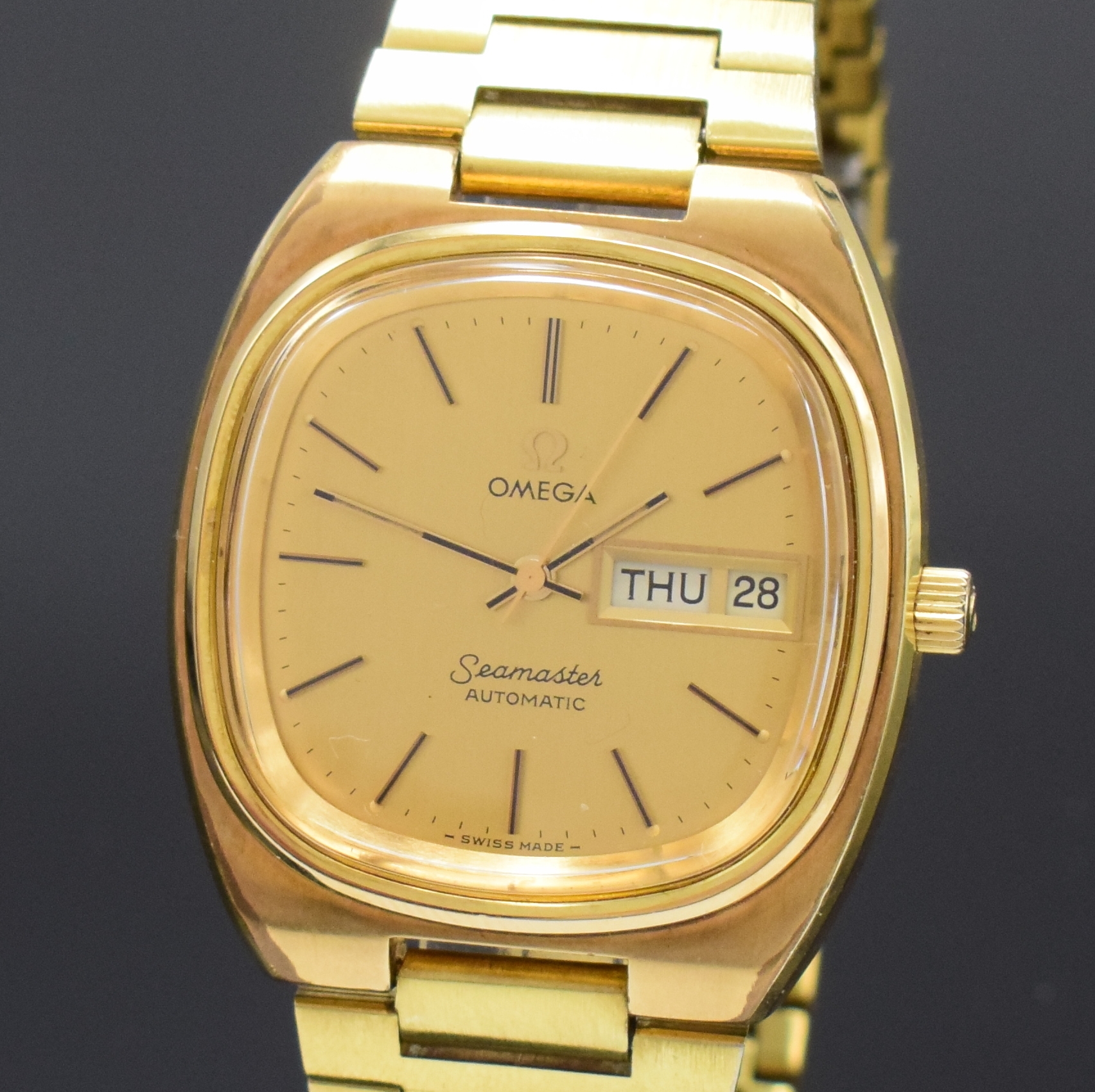 Detail a: OMEGA Seamaster vergoldete Herrenarmbanduhr Referenz 168.0213, Schweiz um 1979, Automatik, orig. verg. Gliederband m. Faltschl., Boden aufgedr., ...