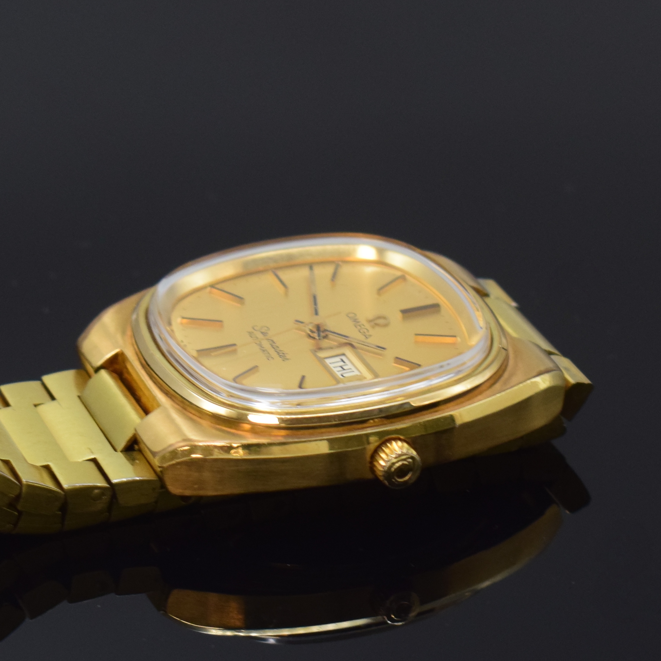 Detail c: OMEGA Seamaster vergoldete Herrenarmbanduhr Referenz 168.0213, Schweiz um 1979, Automatik, orig. verg. Gliederband m. Faltschl., Boden aufgedr., ...