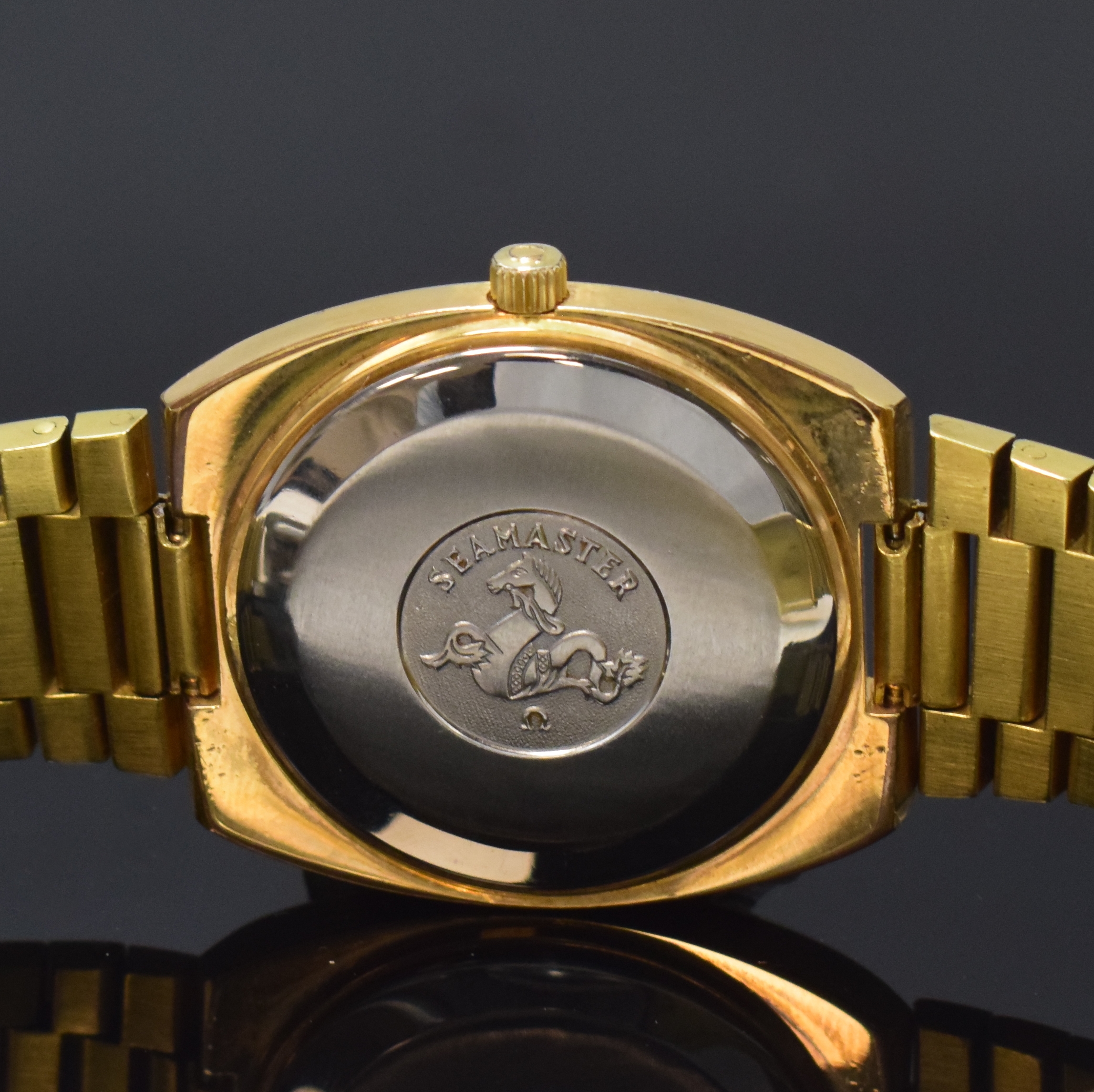 Detail d: OMEGA Seamaster vergoldete Herrenarmbanduhr Referenz 168.0213, Schweiz um 1979, Automatik, orig. verg. Gliederband m. Faltschl., Boden aufgedr., ...
