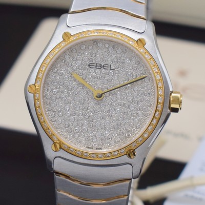 26790366b - EBEL mint, to 200 pieces limited ladies wristwatch Sport Classic reference 1216563, stainless steel/gold combined including wave bracelet with butterfly buckle, quartz, case back screwed-down 4-times, bezel such as dial lavish with original Brillantbesatz additional approx. 0,813 ct, display of hours & minutes, diameter approx. 29 mm, length approx. 18,5 cm, original box, Edelsteinzertifikat & warranty papers, condition 1