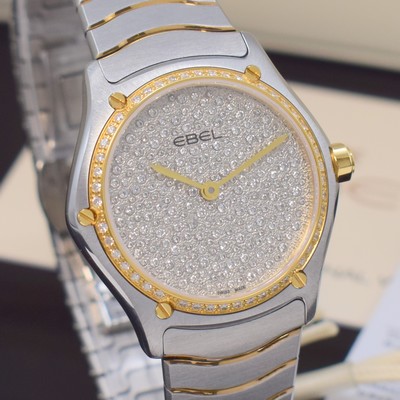 26790366e - EBEL mint, to 200 pieces limited ladies wristwatch Sport Classic reference 1216563, stainless steel/gold combined including wave bracelet with butterfly buckle, quartz, case back screwed-down 4-times, bezel such as dial lavish with original Brillantbesatz additional approx. 0,813 ct, display of hours & minutes, diameter approx. 29 mm, length approx. 18,5 cm, original box, Edelsteinzertifikat & warranty papers, condition 1