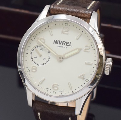 26790433a - NIVREL mint gents wristwatch reference N322.001, manual winding, on both sides glazed stainless steel case including original leather strap with original buckle, case back screwed-down 4-times, white dial with applied indices, silvered luminous hands, display of hours, minutes & constant second, diameter approx. 44 mm, original box & warranty papers, condition 1