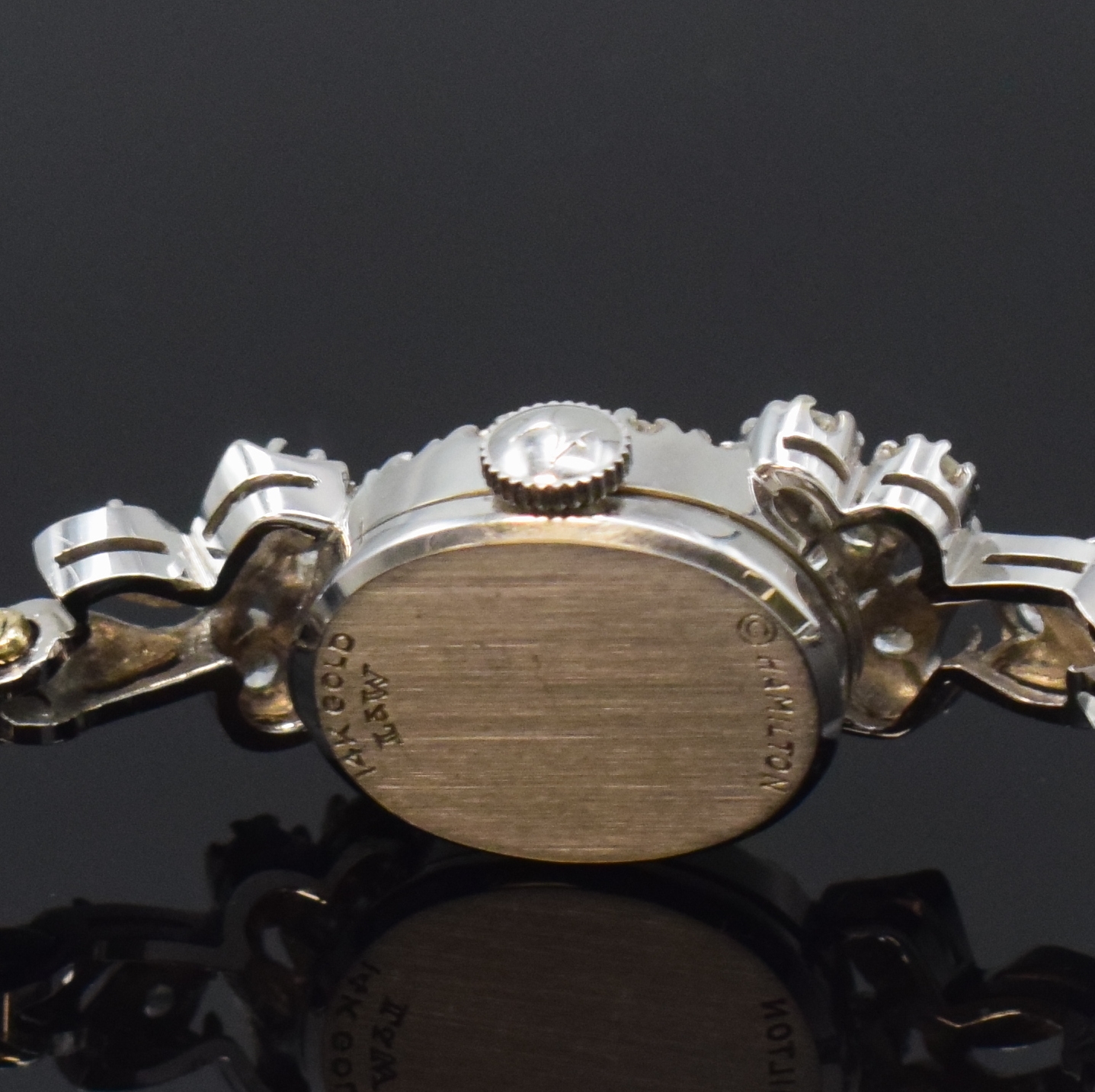 Detail d: HAMILTON Damenarmbanduhr in WG 585/000 mit Diamanten, USA um 1965, Handaufzug, Geh. an Goldband, Sicherheitskettchen, Boden aufgedr., orig. Krone, ...