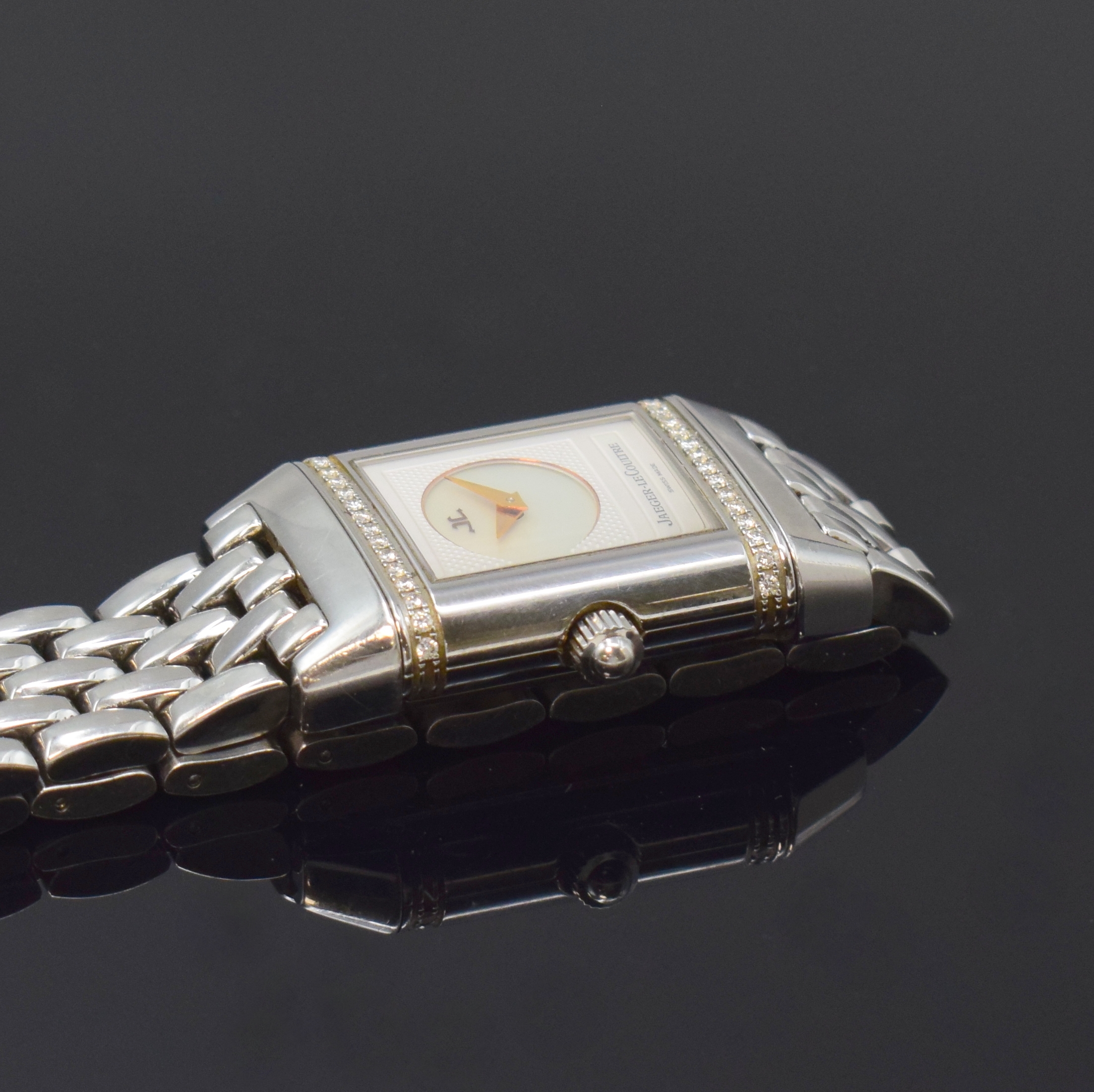 Detail e: Jaeger-LeCoultre Reverso Duetto Damenarmbanduhr Referenz 266.8.44, Schweiz um 2000, Handaufzug, Edelstahl-Wendegeh., orig. Gliederband m. dopp. ...