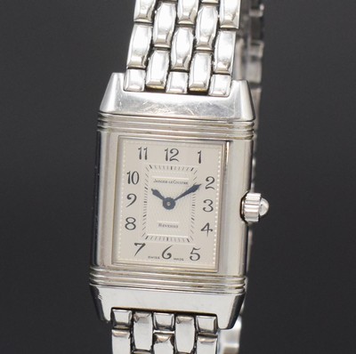 26790793a - Jaeger-LeCoultre Reverso Duetto ladies wristwatch reference 266.8.44, Switzerland around 2000, manual winding, stainless steel- reverse case, original bracelet with butterfly buckle, one page engine-turned dial in the middle with mother of pearl and outside diamonds, gilded hands, other side silvered, Arabic numerals, blued steel hands, in center engine-turned, measures approx. 33 x 21 mm, length approx. 19,5 cm, JL box enclosed, signs of use otherwise condition 2
