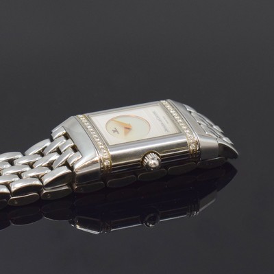 26790793e - Jaeger-LeCoultre Reverso Duetto ladies wristwatch reference 266.8.44, Switzerland around 2000, manual winding, stainless steel- reverse case, original bracelet with butterfly buckle, one page engine-turned dial in the middle with mother of pearl and outside diamonds, gilded hands, other side silvered, Arabic numerals, blued steel hands, in center engine-turned, measures approx. 33 x 21 mm, length approx. 19,5 cm, JL box enclosed, signs of use otherwise condition 2