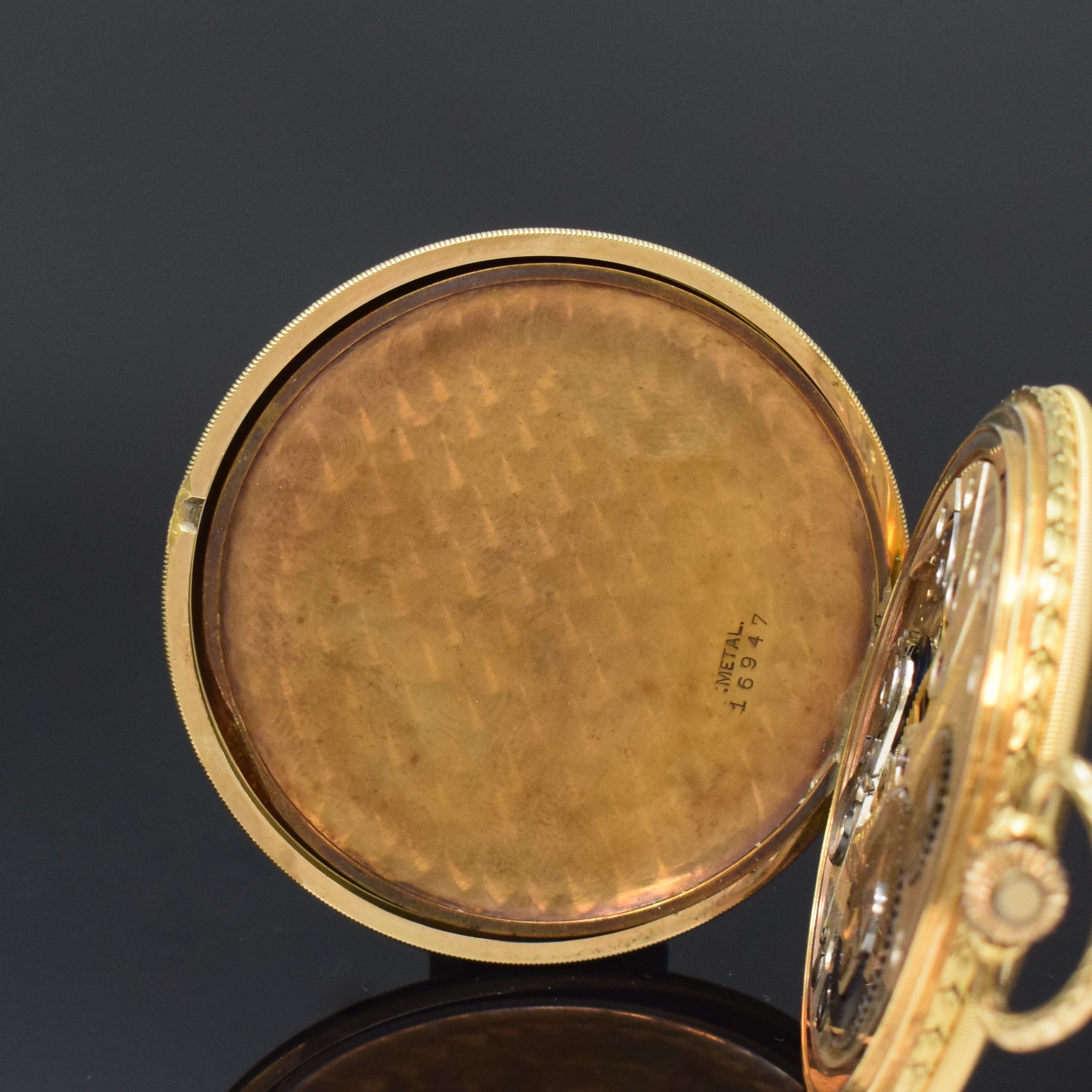 Detail f: RECORD WATCH Co. Savonette in GG 585/000, Schweiz um 1925, guill. 2 Deckel Goldgeh., gold. Zifferbl. pat., Zeiger später, vers. Werk m. Genfer ...