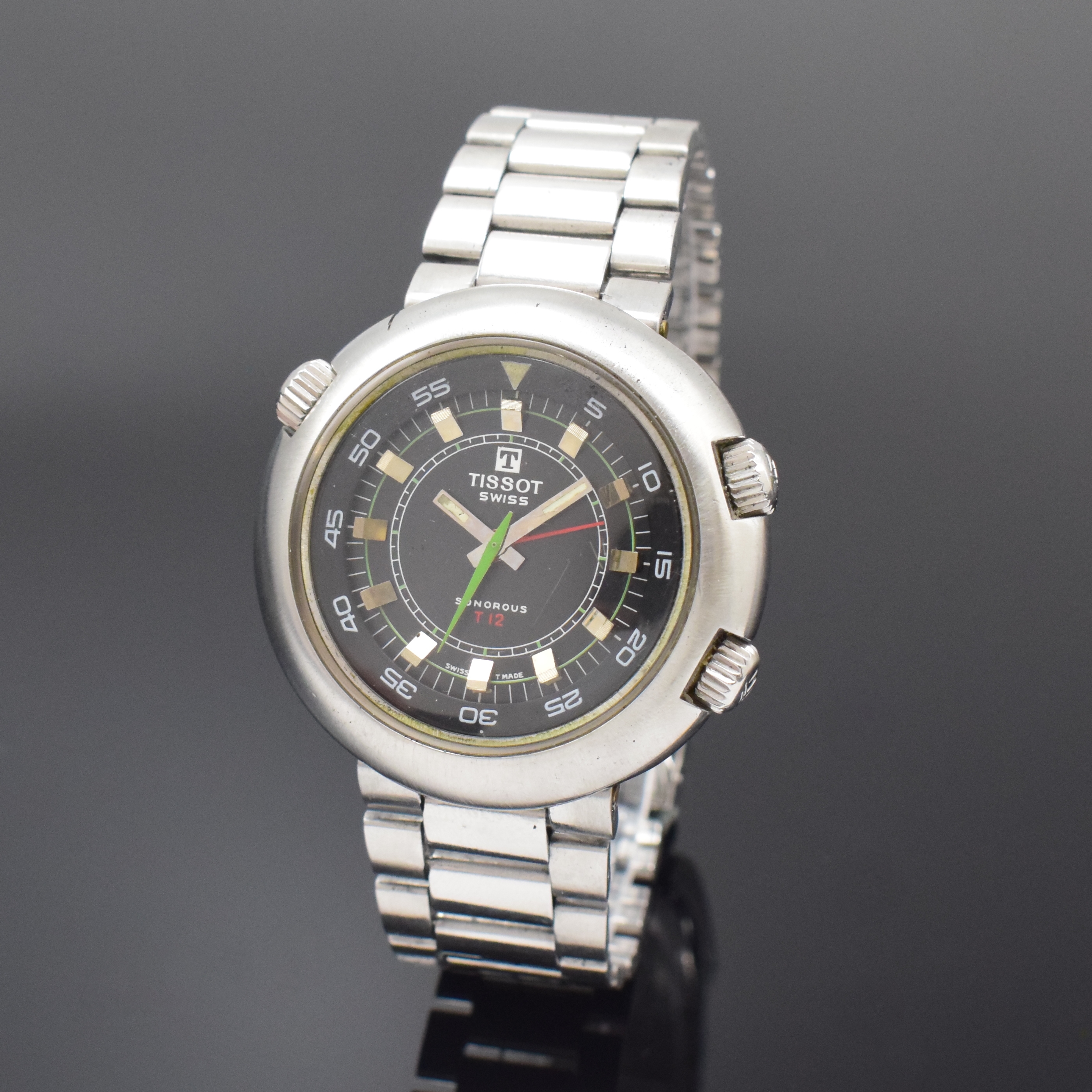 TISSOT Sonorous T12 Herrenarmbanduhr in Stahl mit Wecker, Schweiz um 1970, Handaufzug, Boden aufgedr., Gay Freres Gliederband m. Faltschl., drehb. ...