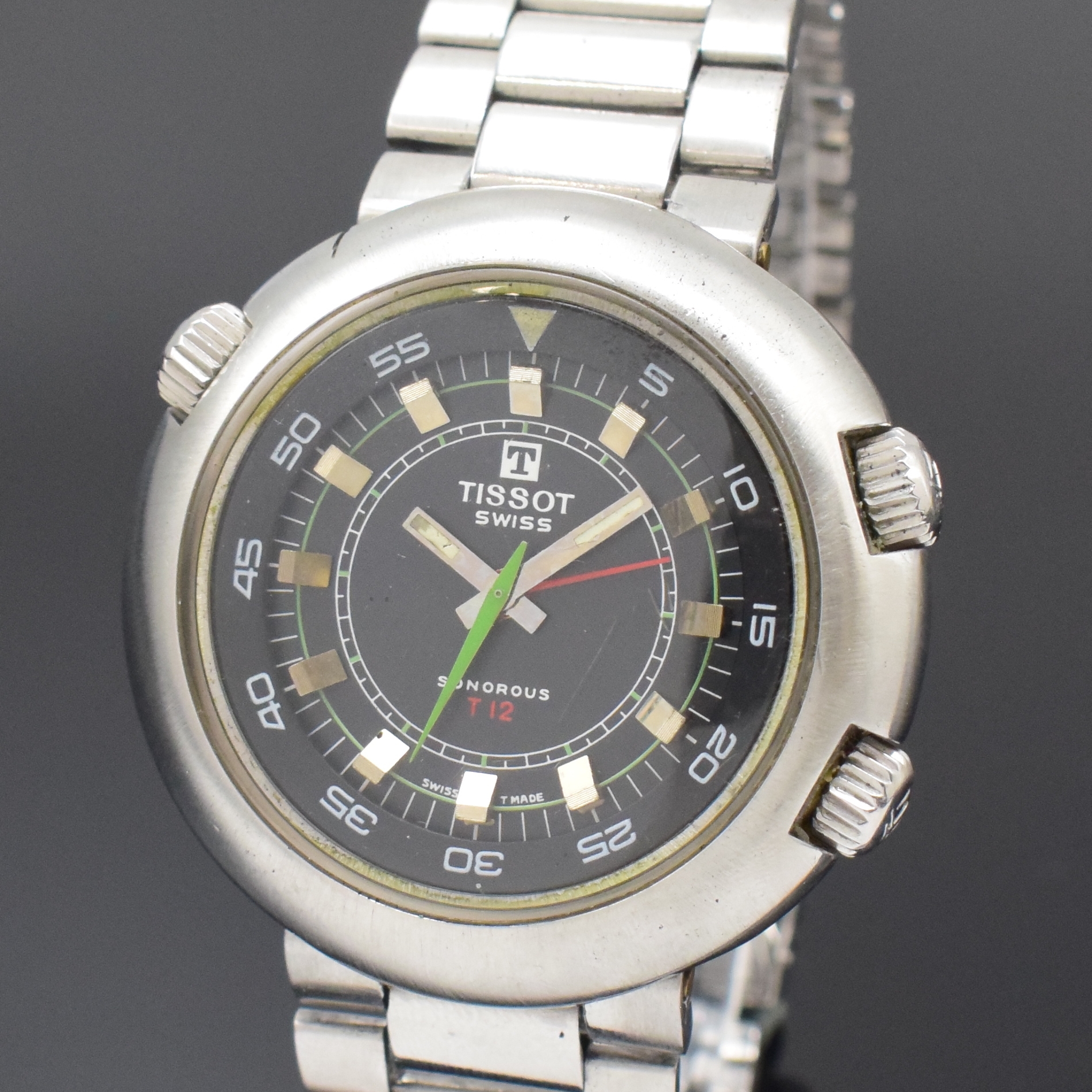 Detail a: TISSOT Sonorous T12 Herrenarmbanduhr in Stahl mit Wecker, Schweiz um 1970, Handaufzug, Boden aufgedr., Gay Freres Gliederband m. Faltschl., drehb. ...