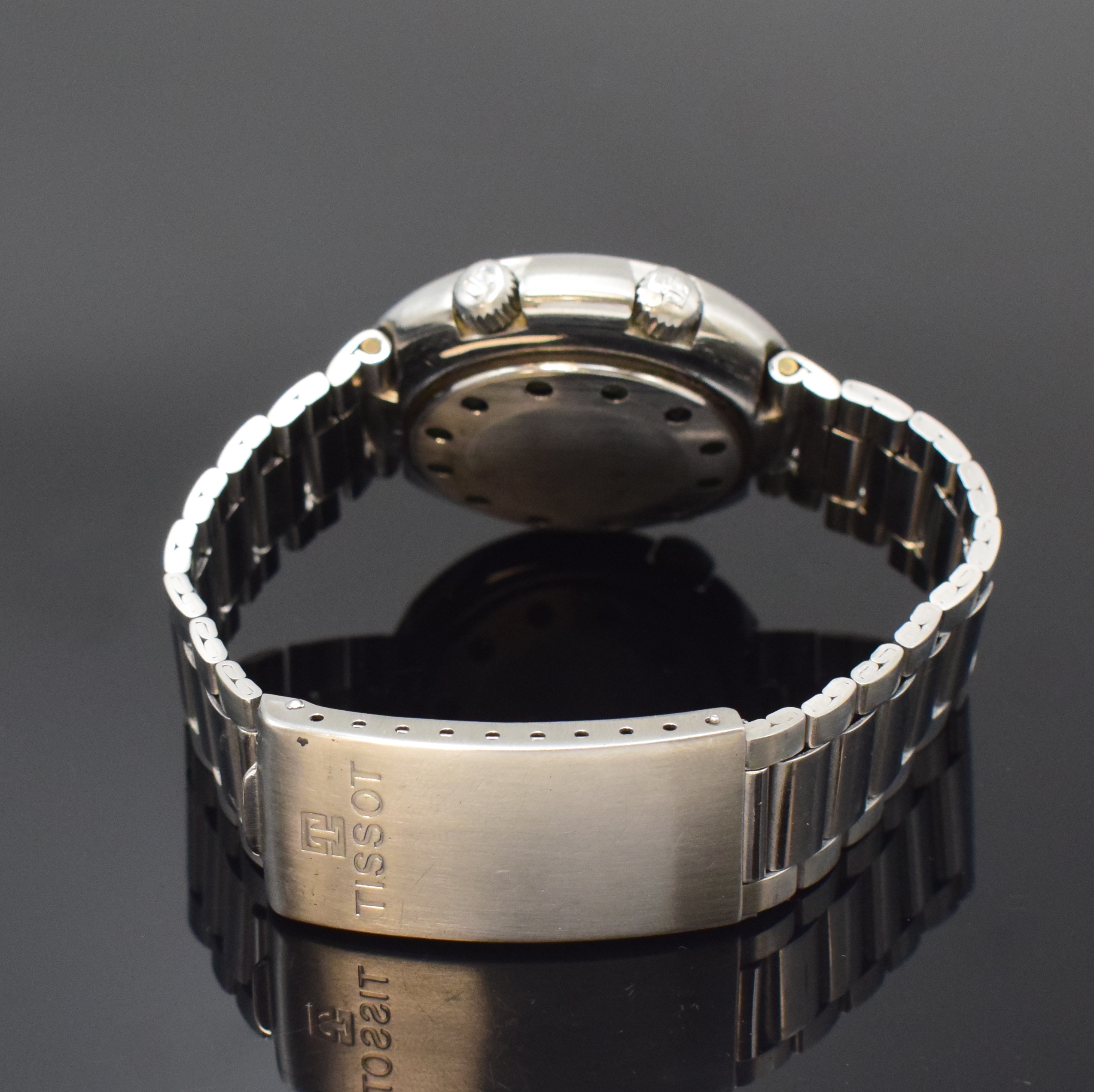 Detail b: TISSOT Sonorous T12 Herrenarmbanduhr in Stahl mit Wecker, Schweiz um 1970, Handaufzug, Boden aufgedr., Gay Freres Gliederband m. Faltschl., drehb. ...