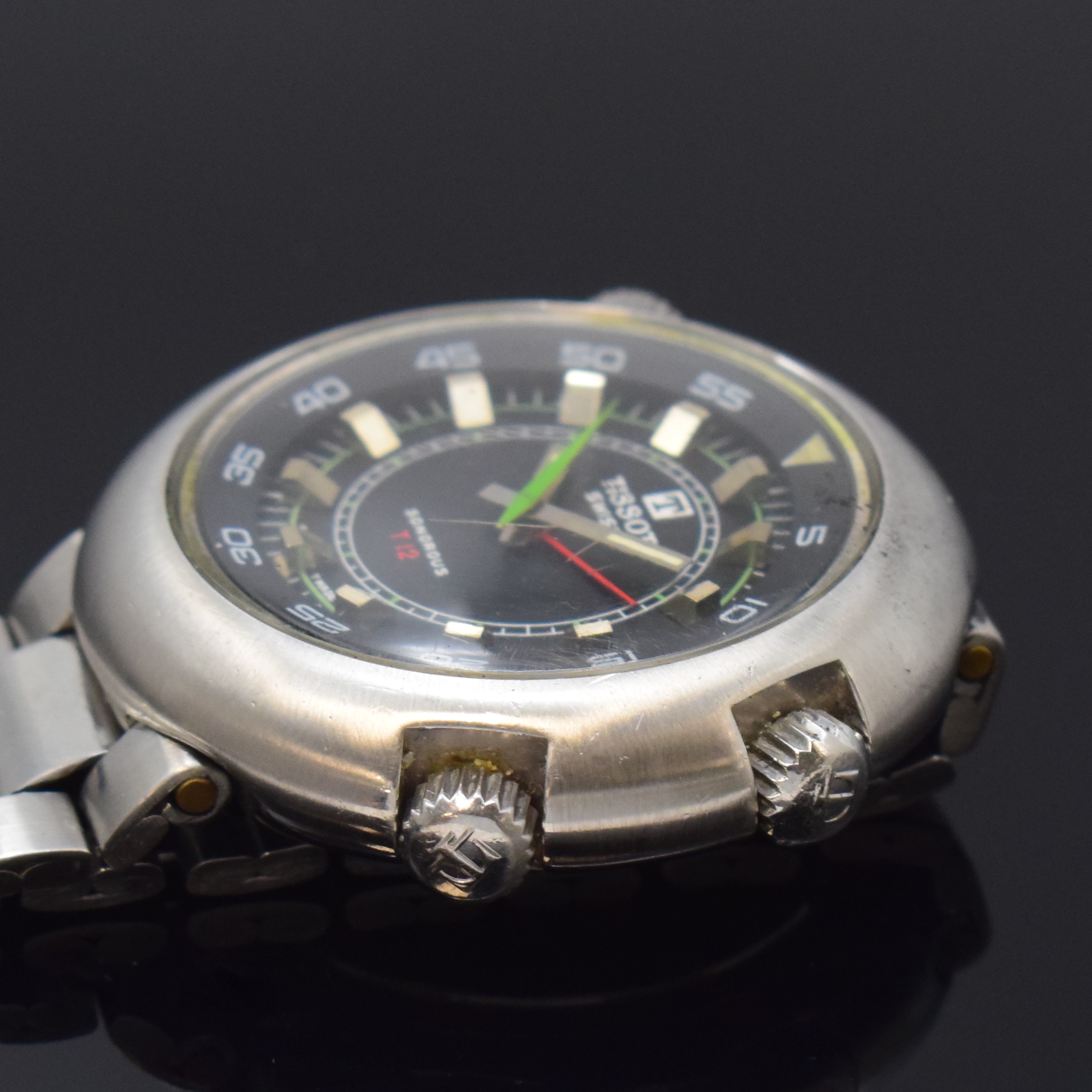 Detail c: TISSOT Sonorous T12 Herrenarmbanduhr in Stahl mit Wecker, Schweiz um 1970, Handaufzug, Boden aufgedr., Gay Freres Gliederband m. Faltschl., drehb. ...