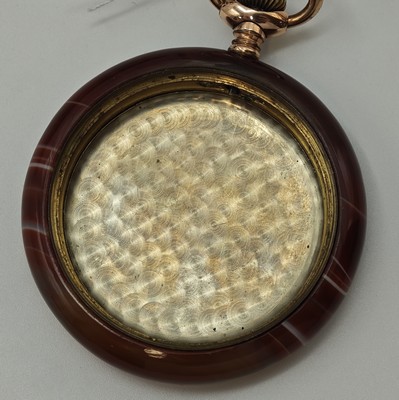 26790946d - ZENITH open face pocket watch in agate-case with 14k gold chain including agate-ball, Switzerland around 1920, monocoque case with screwed down gold-plated bezel, enamel dial with Arabic numerals, constant second at 6, blued spade hands, silvered movement with decoration polishing, 15 jewels, compensation-balance with Breguet-hairspring, precision adjustment, diameter approx. 52 mm, length approx. 29 cm, overhaul recommended at buyer's expense, condition 2-3, property of a collector
