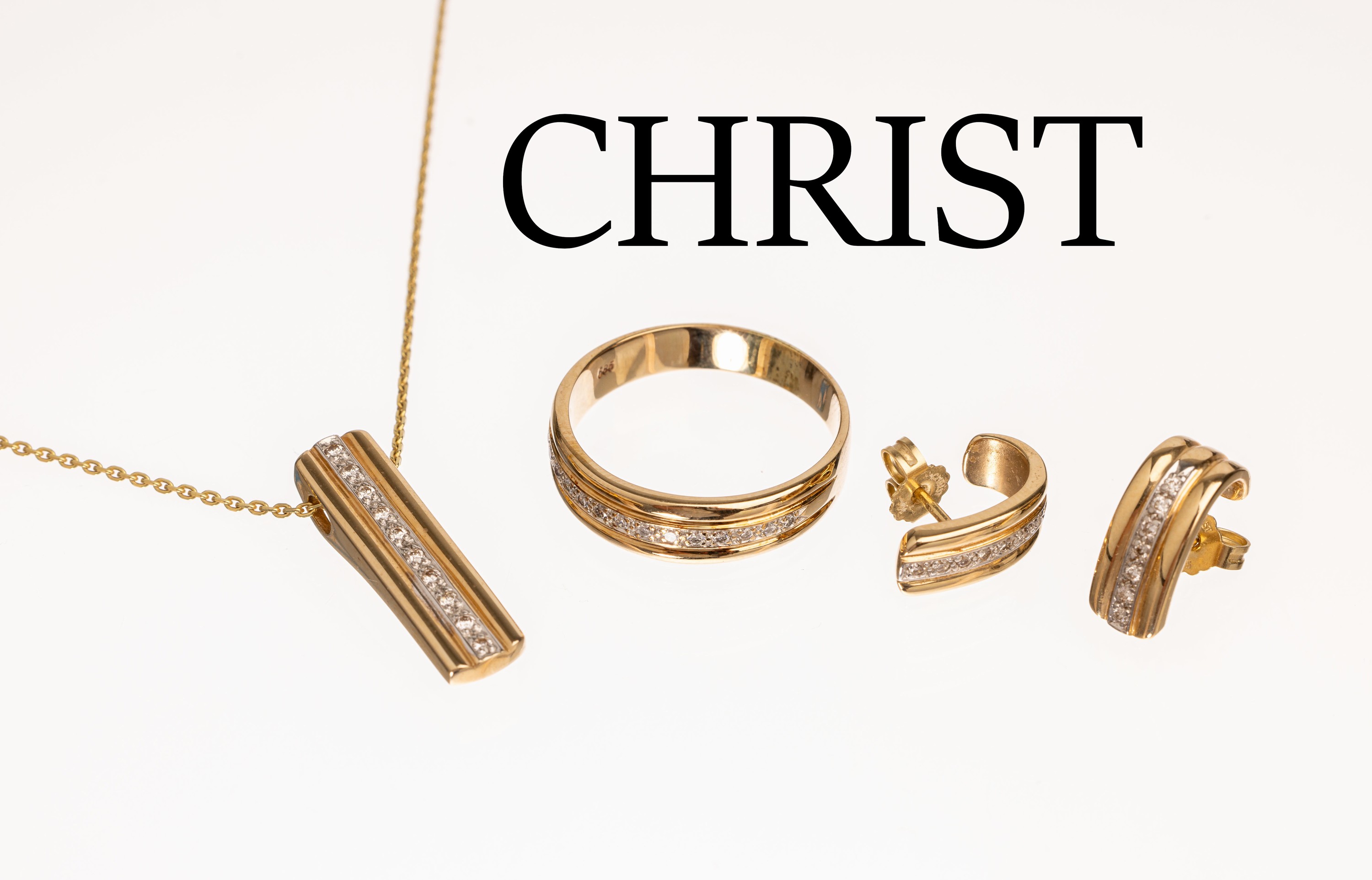 14 kt Gold CHRIST Brillant Schmuckset, GG/WG 585/000, best. aus: Anhänger mit 10 Brillanten zus. ca. 0.10 ct Weiß/si, an 8 kt Goldkette, GG ...