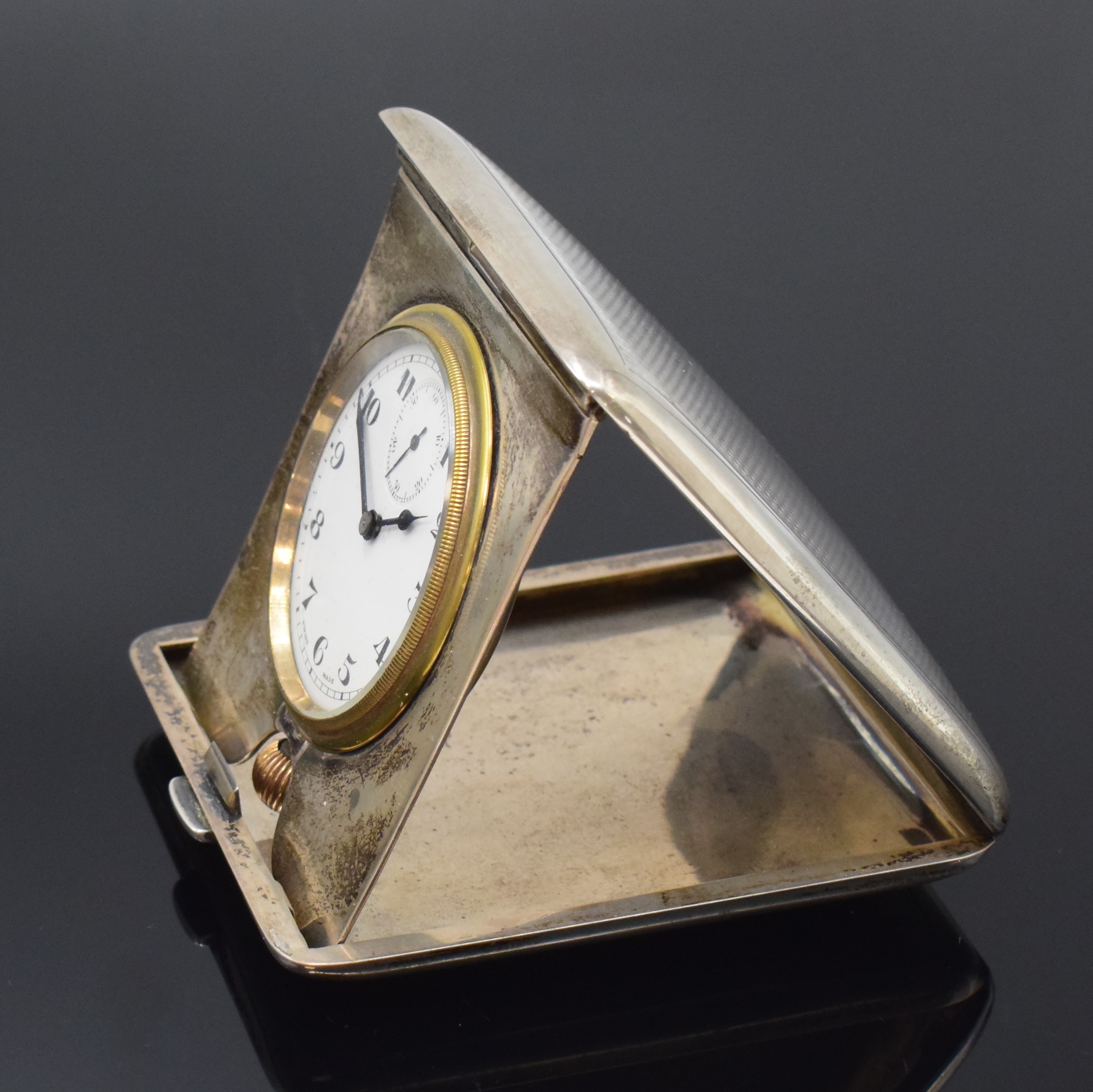 Detail d: DOXA Reiseuhr im Sterlingsilber-Gehäuse, London lt. Hallmark 1921, Handaufzug, aufklappbares Geh. dell., Scharnierboden, Emailzifferbl. m. arab. ...