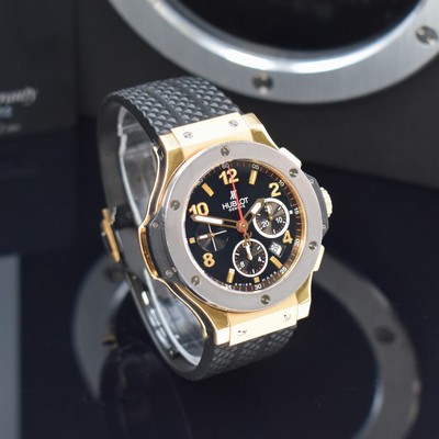 26791527b - HUBLOT rare, to 250 pieces limited chronograph Big Bang reference 301.PT.130RX, self winding, 18k pink gold & tantalum combined including original rubber strap with original deployant clasp, on both sides glazed, case back to bezel 6-times screwed, black dial with applied indices, display of hours, minutes, constant second, date & chronograph, diameter approx. 44 mm, original box & papers, condition 2