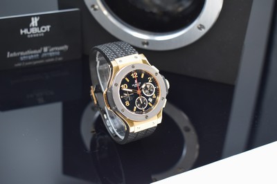 26791527c - HUBLOT rare, to 250 pieces limited chronograph Big Bang reference 301.PT.130RX, self winding, 18k pink gold & tantalum combined including original rubber strap with original deployant clasp, on both sides glazed, case back to bezel 6-times screwed, black dial with applied indices, display of hours, minutes, constant second, date & chronograph, diameter approx. 44 mm, original box & papers, condition 2