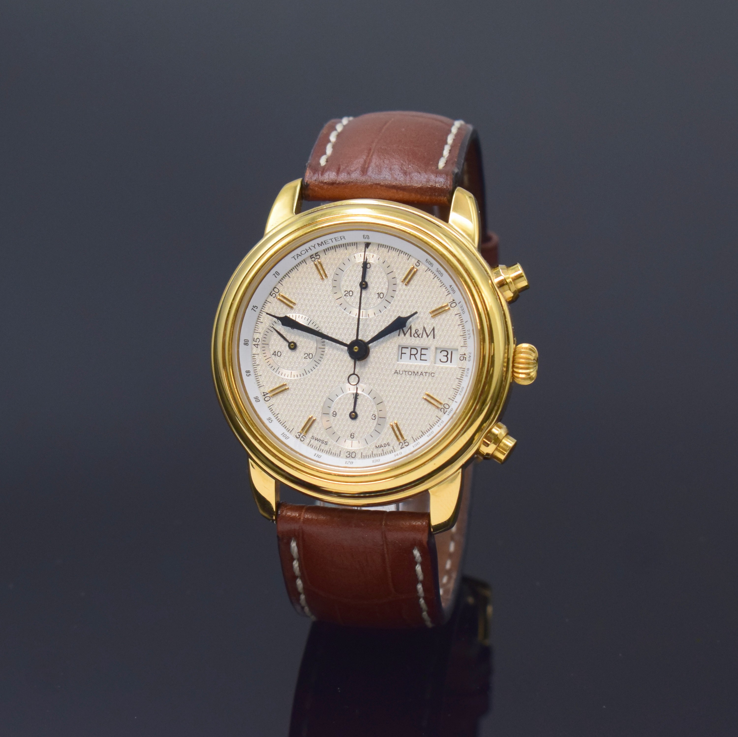 M & M Armbandchronograph, Automatik, Schweiz um 1990, verg. Edelstahlgeh. beids. vergl., Boden und Glasrand aufgedr., silb., guill. Zifferbl. m. ...