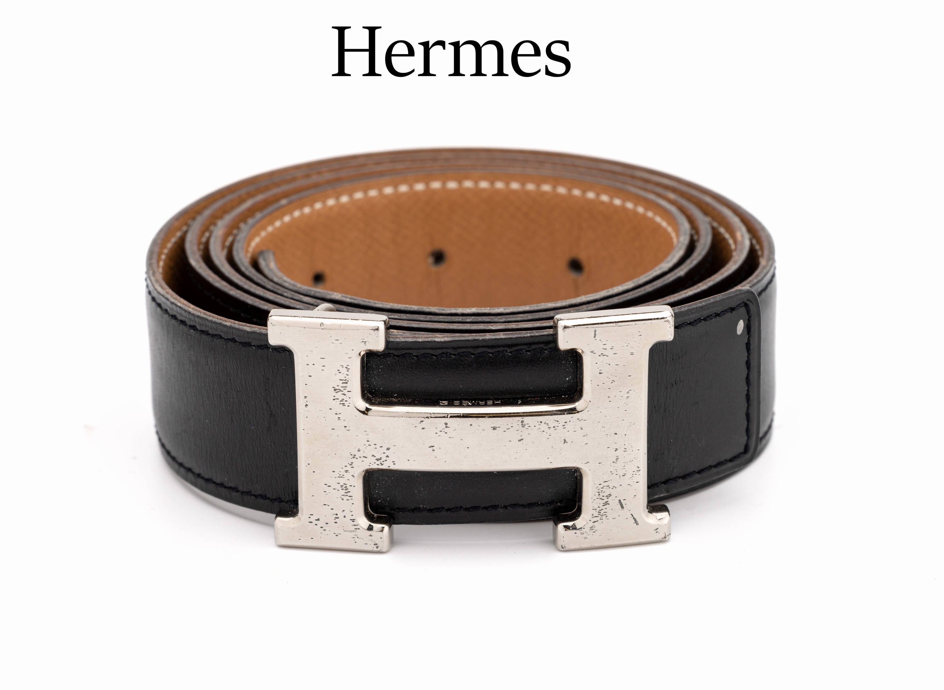 HERMES Wende-Gürtel, Vintage, schwarzes Glattleder/cognacfarb. genarbtes Leder, H -Schnalle Metall, sign., Gr. 105, B. ca. 3 cm,Tragespuren