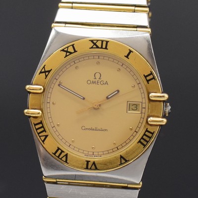 26792111a - OMEGA gents wristwatch Constellation reference 396.1070/396.1080, Switzerland around 1990, stainless steel/gold combined including bracelet, snap on case back, gold bezel with black, Roman indices, gilded dial, quartz, display of hours, minutes, sweep seconds and date, diameter approx. 33 mm, length approx. 19 cm, Omega box, condition 2-3