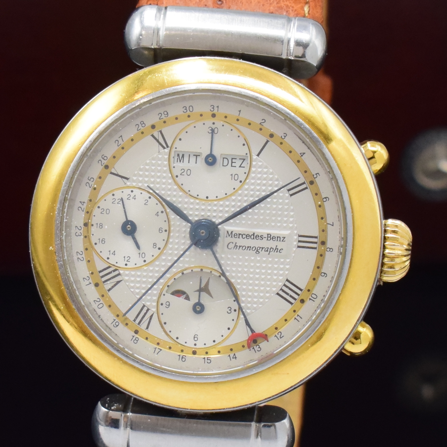 Detail a: MERCEDES BENZ Armbandchronograph, Automatik, Schweiz um 1998, Edelstahl/Gold kombiniert inkl. orig. Lederband m. Faltschl., beids. vergl., teilguill. ...