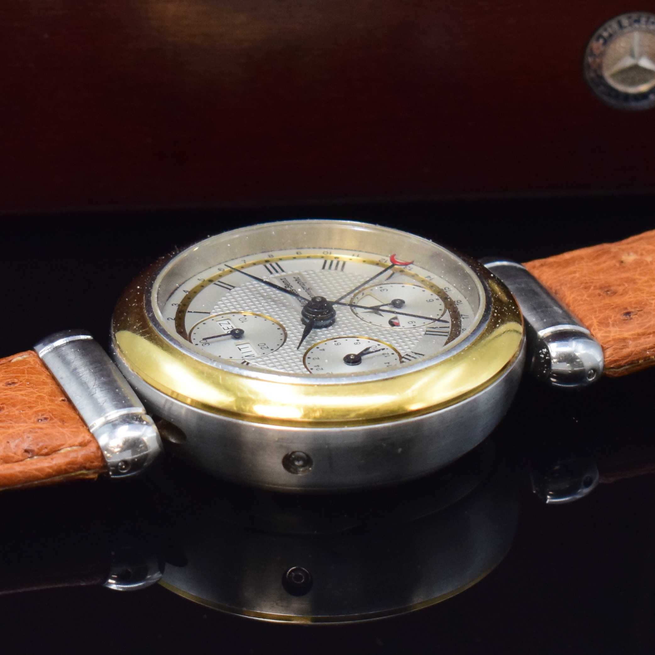Detail d: MERCEDES BENZ Armbandchronograph, Automatik, Schweiz um 1998, Edelstahl/Gold kombiniert inkl. orig. Lederband m. Faltschl., beids. vergl., teilguill. ...