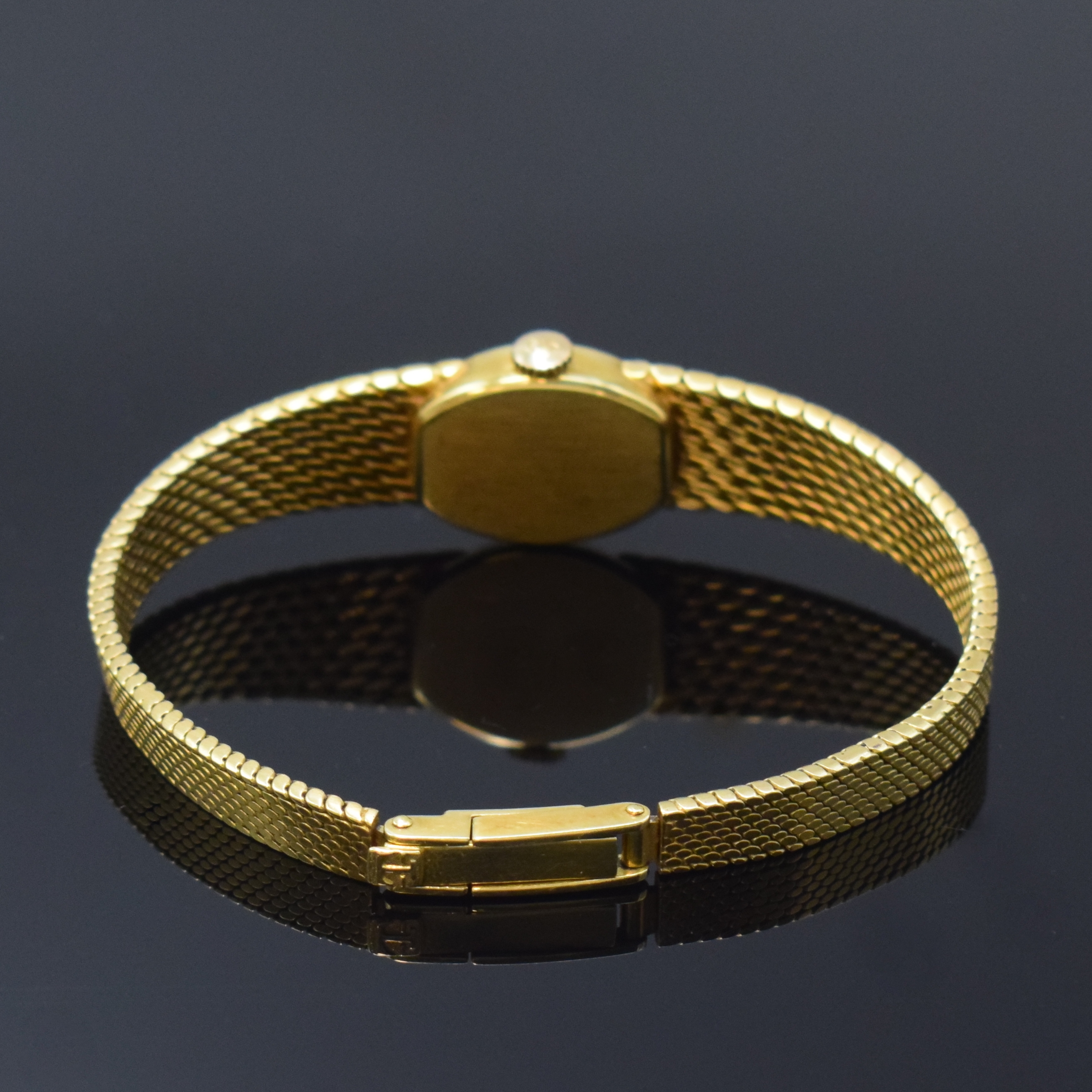 Detail b: TISSOT Damenarmbanduhr in GG 585/000, Schweiz um 1965, Handaufzug, Boden aufgedr., goldfarb. Zifferbl. m. aufges. Std.-Ind., geschw. Zeiger, rotverg. ...