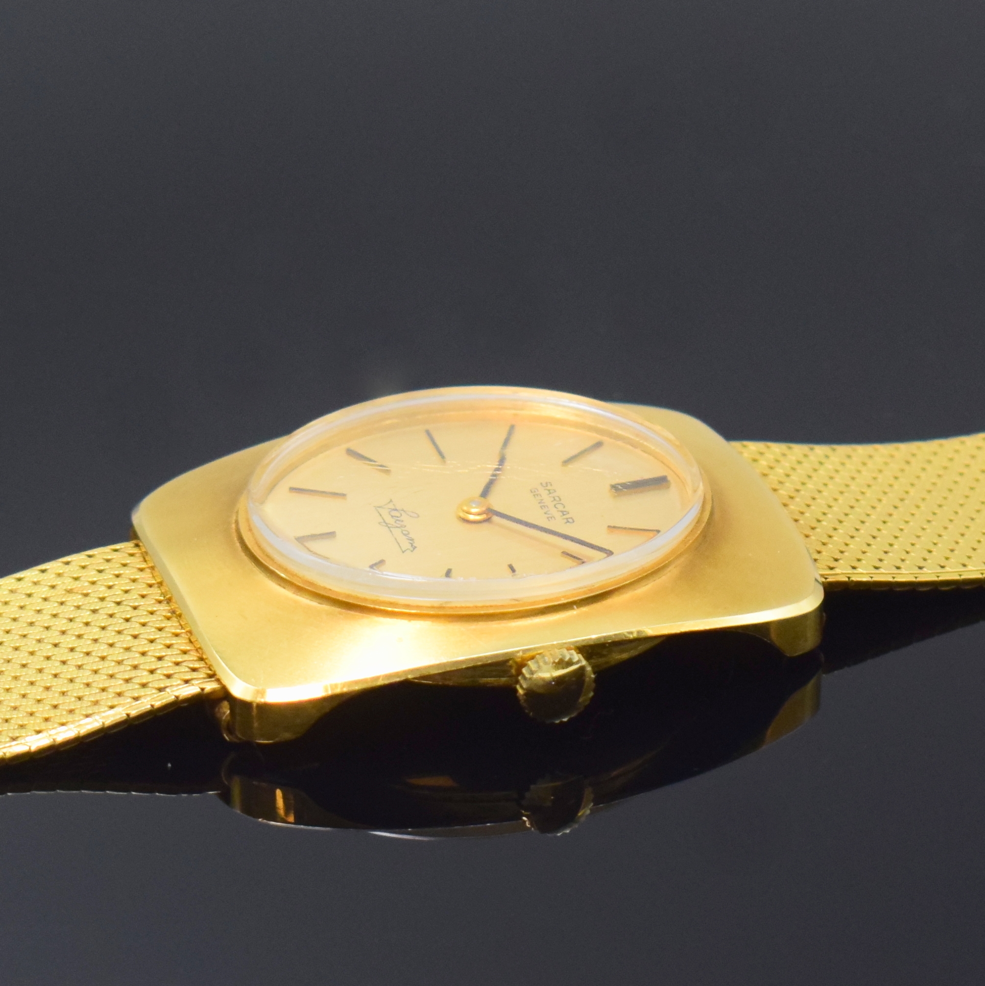 Detail c: SARCAR Armbanduhr in GG 750/000, Schweiz um 1965, Handaufzug, Boden aufgedr., gold. Zifferbl. m. aufges. Std.-Ind., geschw. Zeiger, Kal. Peseux 7040, ...