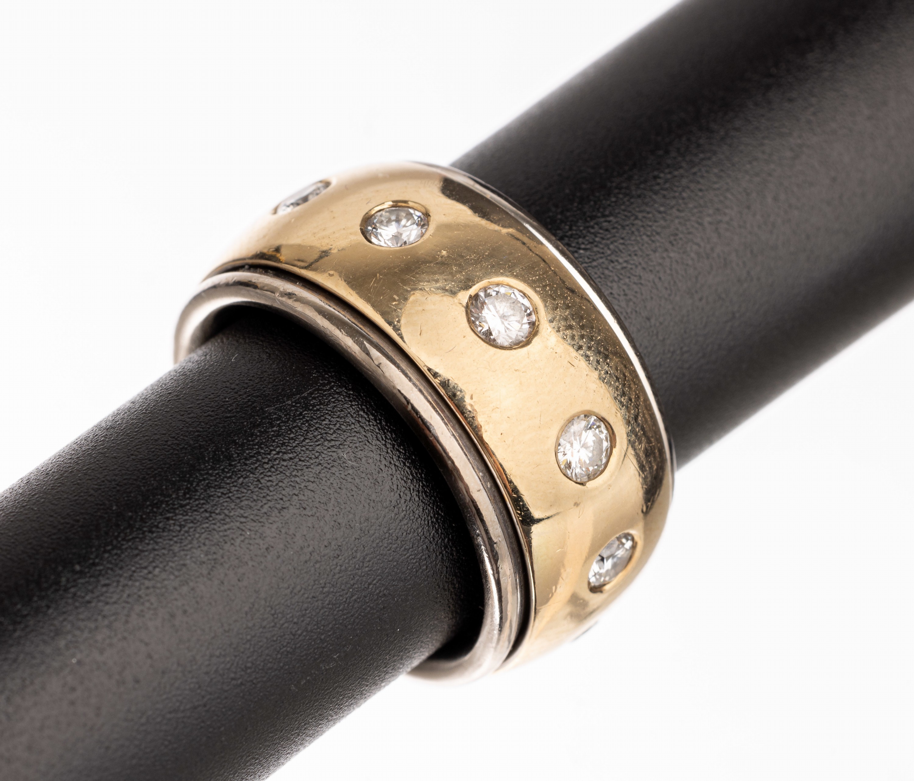 18 kt Gold Brillant-Ring, GG/WG 750/000, drehbare GG Schiene, bes. mit 10 Brillanten zus. ca. 1.00 ct Weiß/si, RW 57, ca. 23.5 g