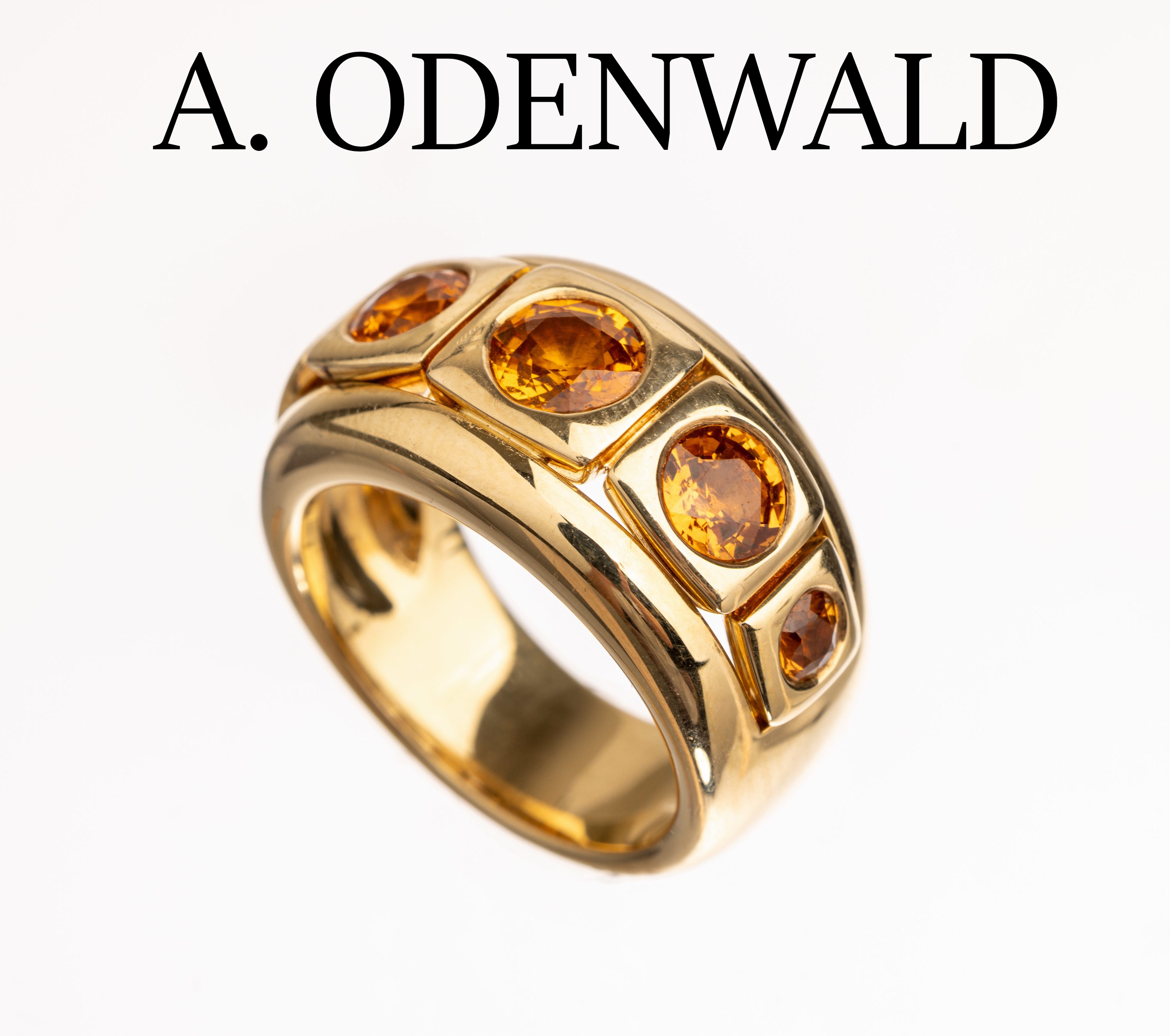 14 kt Gold Saphir-Ring, GG 585/000, sign. A. ODENWALD, 5 rundfacett. orangefarb. Saphirezus. ca. 2.64 ct grav., RW 56, ca. 18.3 g