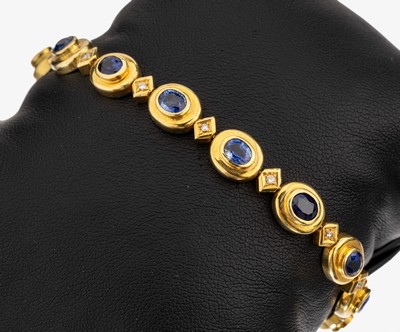 Image 14 kt gold sapphire diamond bracelet , YG 585/000, with 14 ovalfacett sapphires total ...