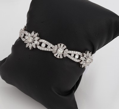 Image Platinum bracelet with diamonds, 1950s , blossom shaped elements, diamond marquises, - ...