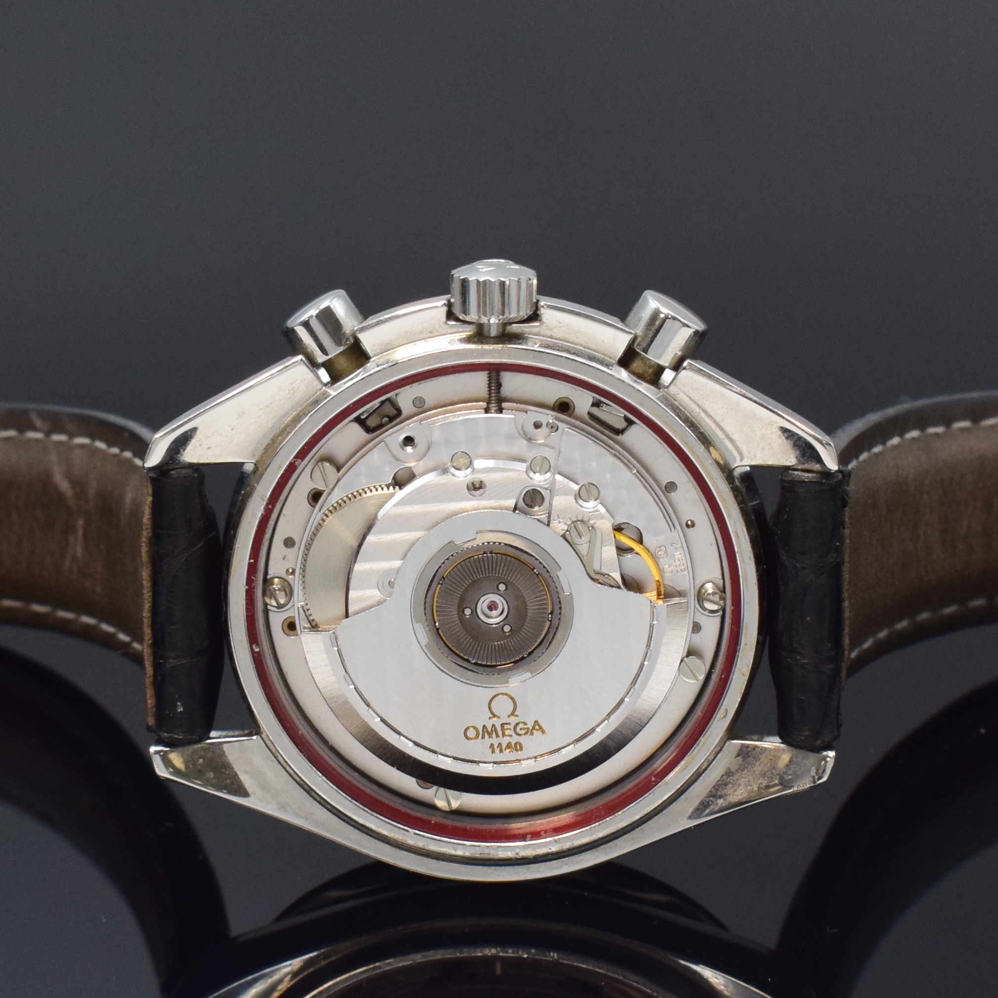 Detail e: OMEGA Armbandchronograph Speedmaster Referenz 175.0032, Schweiz um 1990, Automatik, Edelstahlgeh., Boden aufgedr., neutr. Lederband m. orig. ...