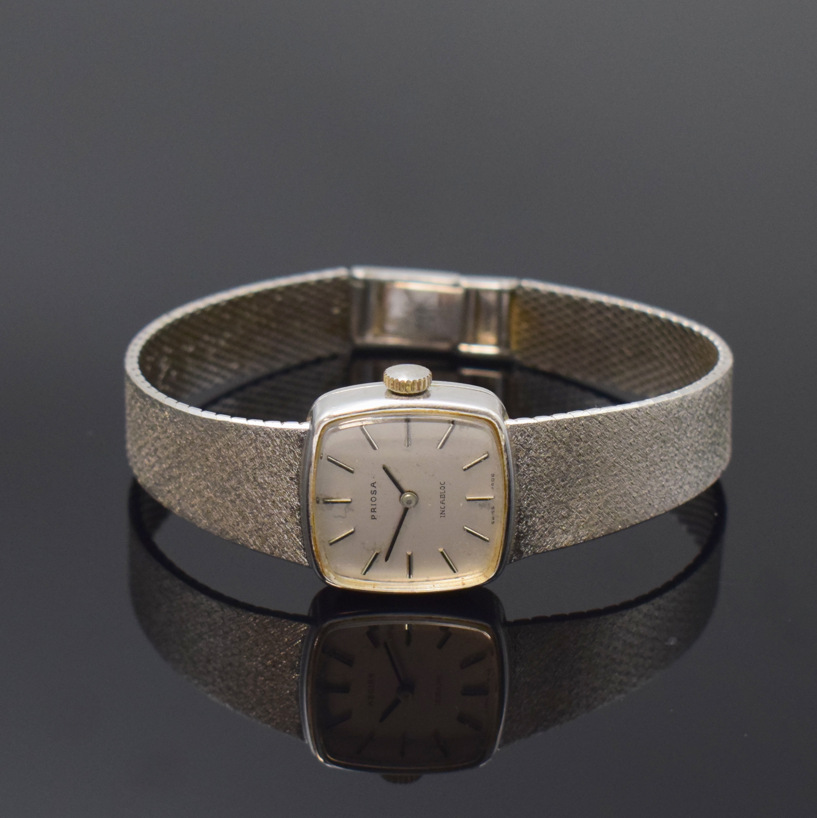 PRIOSA Damenarmbanduhr in WG 585/000, Schweiz um 1965, Handaufzug, Milanaiseband, Boden aufgedr., silb. Zifferbl. fl., aufges. Std.-Ind., geschw. ...