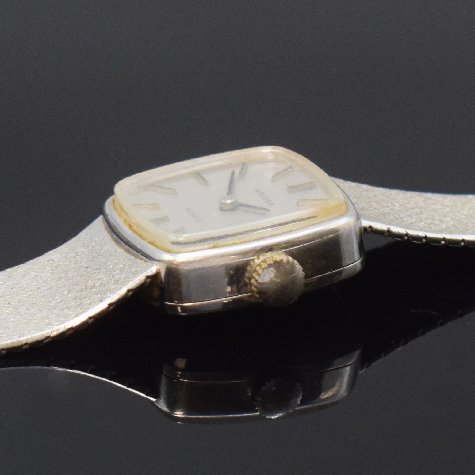 Detail c: PRIOSA Damenarmbanduhr in WG 585/000, Schweiz um 1965, Handaufzug, Milanaiseband, Boden aufgedr., silb. Zifferbl. fl., aufges. Std.-Ind., geschw. ...