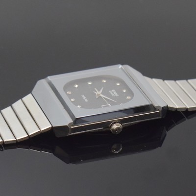 26795055c - RADO wristwatch series Diastar reference 129.0168.3, Switzerland around 1980, scratch- proof case, sapphire glass, original bracelet, quartz, dial with raised 11 applied diamond indices, display of hours, minutes, sweep seconds and date, snap on case back, measures approx. 36 x 30 mm, condition 2-3