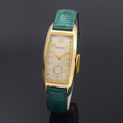 Image 26796414 - GRUEN 10k Goldfilled gents wristwatch reference 500-296, Switzerland/USA around 1937, manual winding, two-piece construction curved case, snap on case back, silvered dial with Arabic numerals patinated, lever movement, 15 jewels, calibre 500, screw- balance, Breguet-hairspring, measures approx. 46 x 21 mm, condition 2-3, property of a collector