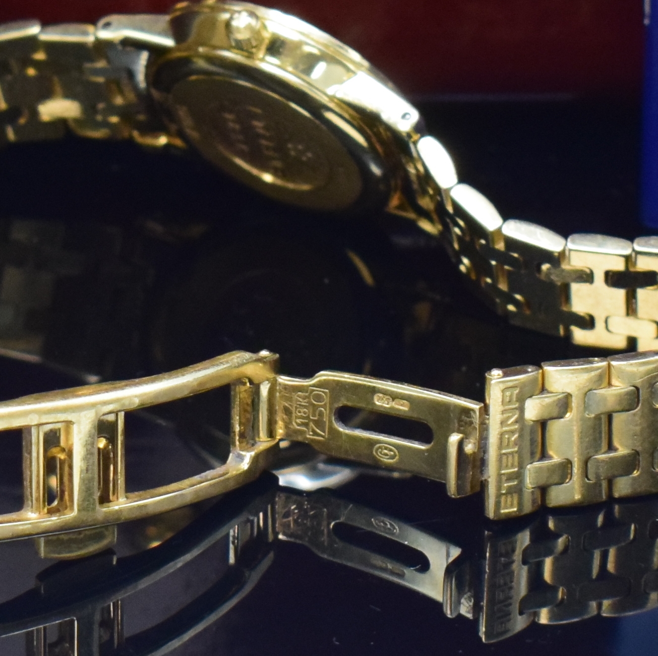 Detail c: ETERNA Damenarmbanduhr in GG 750/000 mit Diamantlünette Referenz 3600.71, quarz, Boden und Diamantlünette aufgedr., Gliederband m. dopp. Faltschl., ...