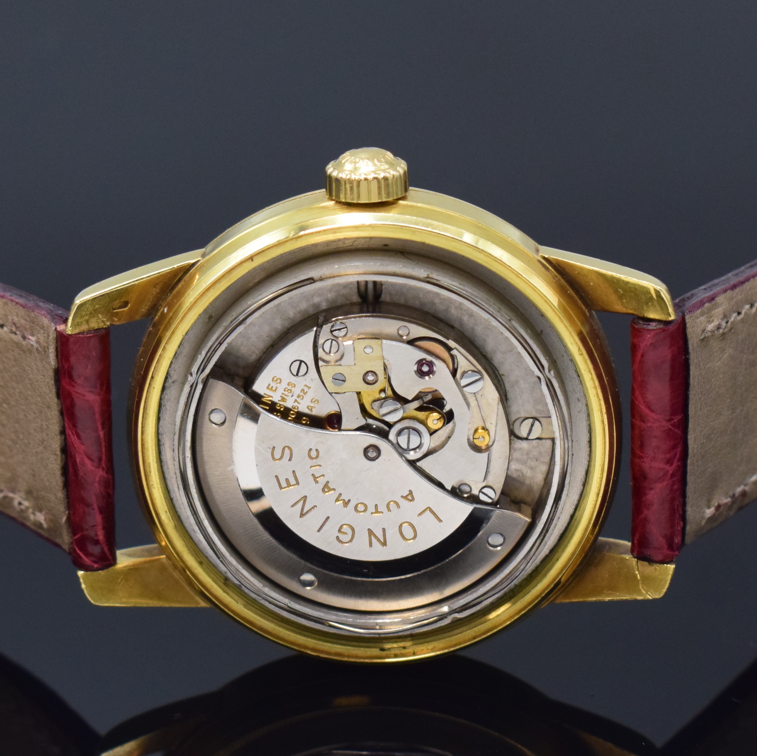 Detail d: LONGINES Conquest Herrenarmbanduhr Referenz 9001 in GG 750/000, Schweiz um 1957, Automatik, unpoliertes Geh., verschr. Boden m.Emailplakette ...