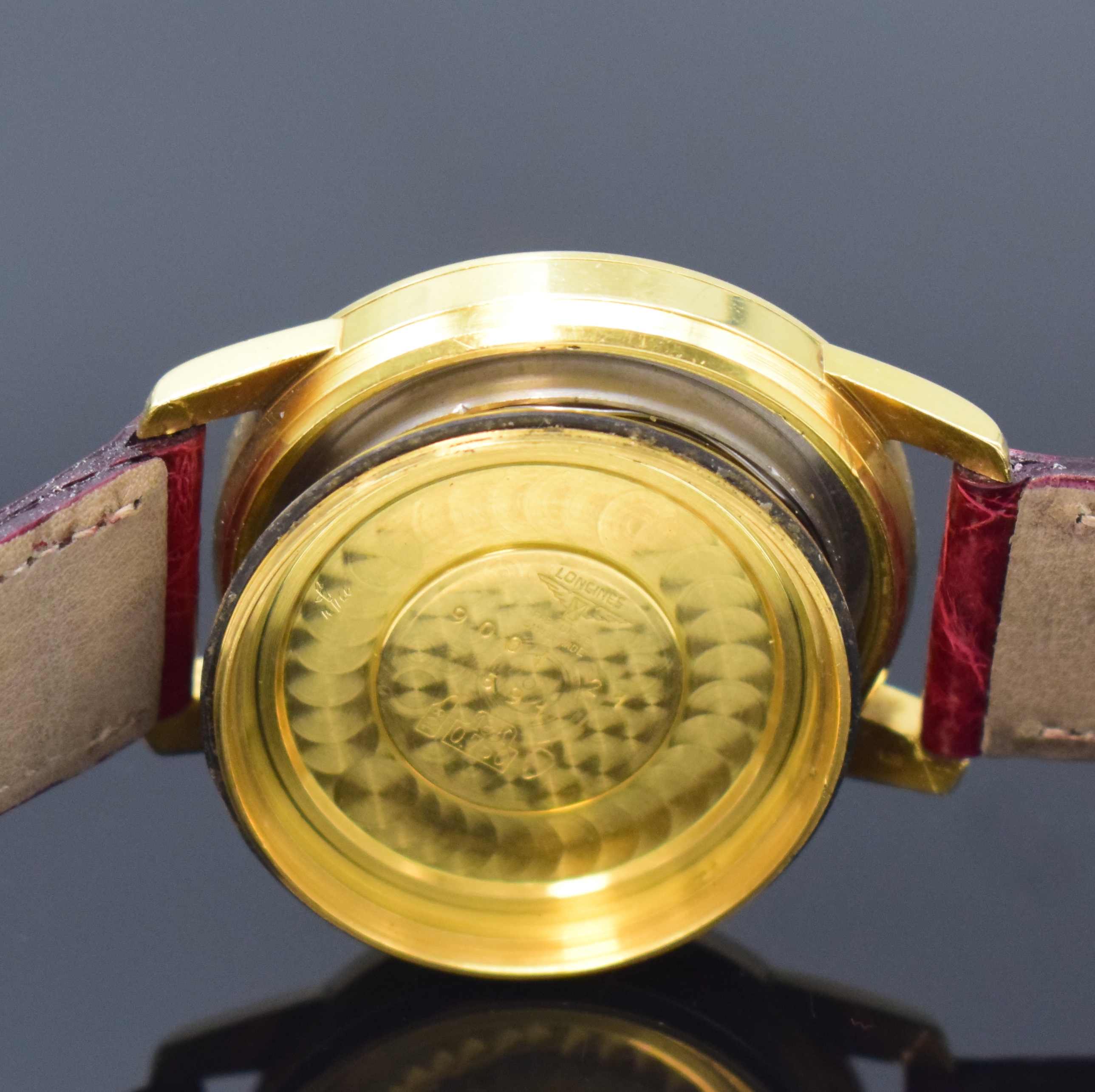 Detail f: LONGINES Conquest Herrenarmbanduhr Referenz 9001 in GG 750/000, Schweiz um 1957, Automatik, unpoliertes Geh., verschr. Boden m.Emailplakette ...