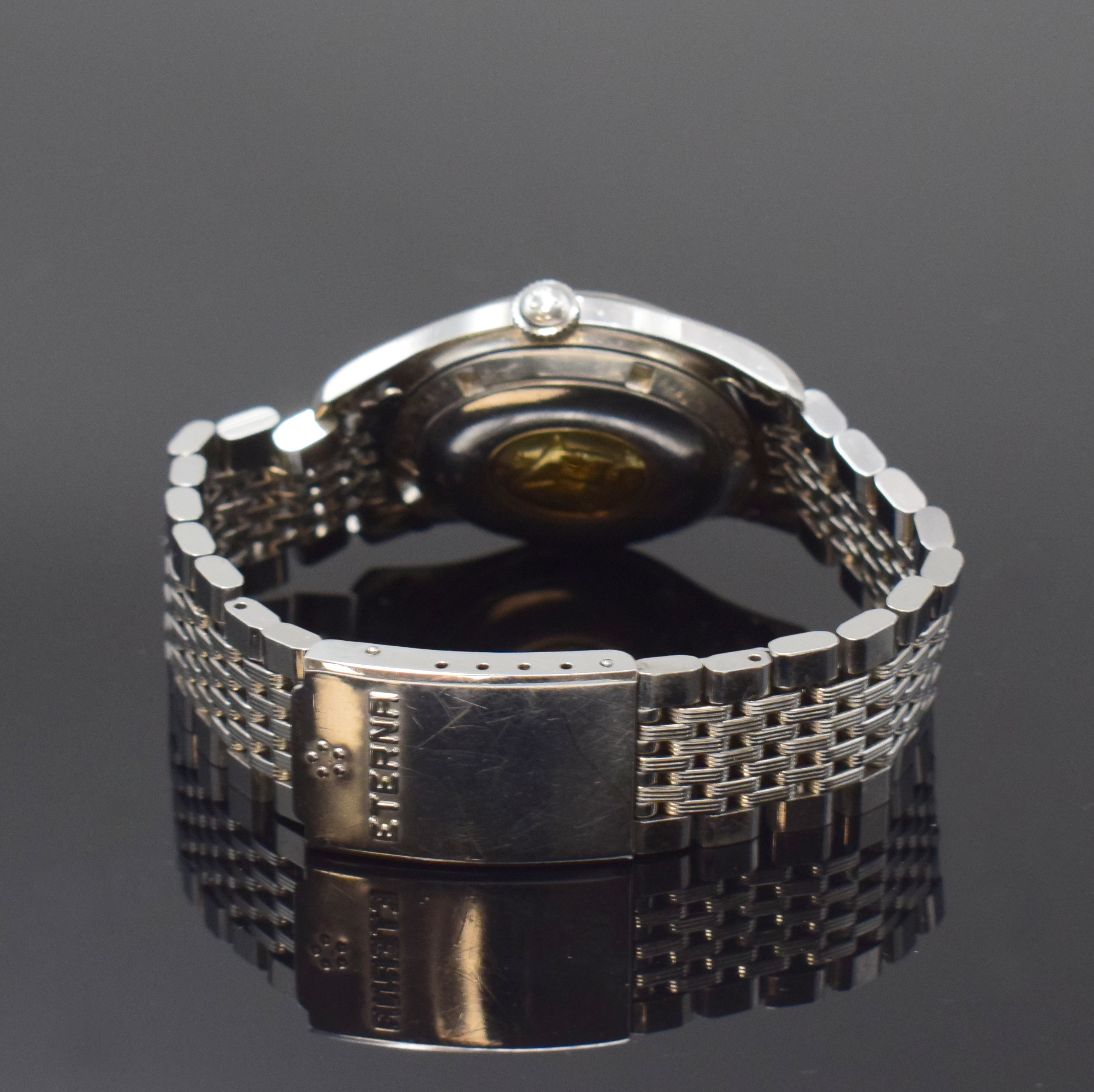 Detail b: ETERNA Kontiki Referenz 130T Herrenarmbanduhr in Stahl/Stahlband, Schweiz um 1960, Automatik, verschr. Geh., Boden m. Kontiki Gold-Plakette, orig. ...
