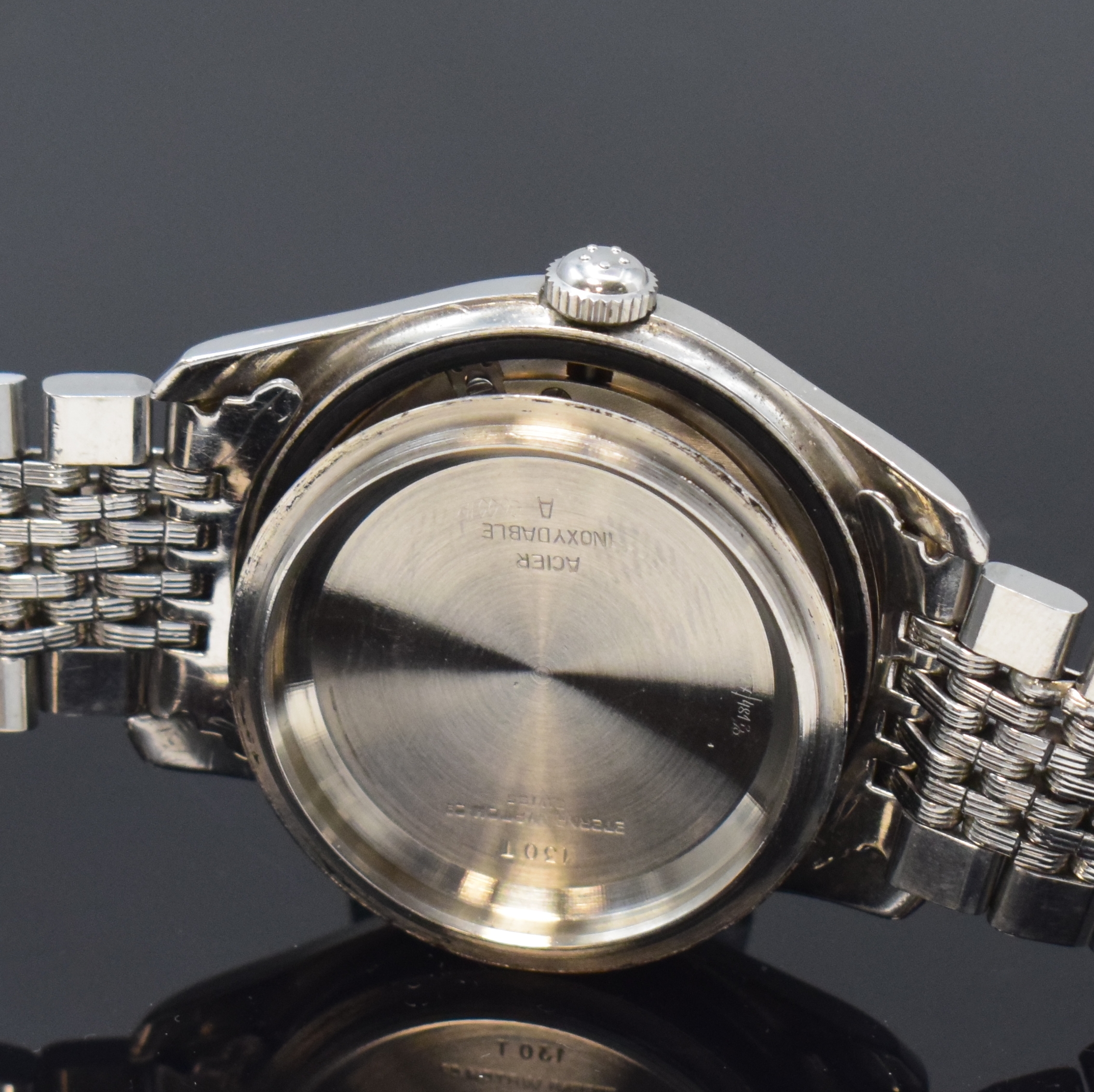 Detail g: ETERNA Kontiki Referenz 130T Herrenarmbanduhr in Stahl/Stahlband, Schweiz um 1960, Automatik, verschr. Geh., Boden m. Kontiki Gold-Plakette, orig. ...