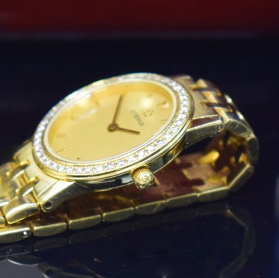 26797163d - ETERNA 18k yellow gold ladies wristwatch with diamonds set bezel reference 3600.71, quartz, snap on case back and diamond bezel, bracelet with butterfly buckle, gilded dial, display of hours and minutes, calibre ETA 976.001, diameter approx. 25 mm, length approx. 17,5 cm, original papers, invoice copy and box without inlay, sold in August 1993, condition 2-3, weight approx. 72g