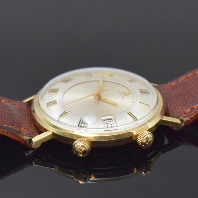 26797165b - LeCOULTRE Memovox gents wristwatch with alarm in 10k gold-Filled, Switzerland USA around 1960, manual winding, monocoque-case, original crowns, rare silvered dial with applied Roman numerals, date at 3, central alarm disc, gilded hands, rhodium plated movement calibre 911, 17 jewels, diameter approx. 35 mm, mainspring of alarm has to be replaced, overhaul recommended at buyer's expense, condition 2-3